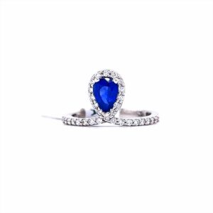 14 Karat White Gold Sapphire And Diamond Halo Fashion Ring. Natural Sapphire 7 X 5mm And Approx 0.29 Ctw Of Diamonds Finger Size 6.5